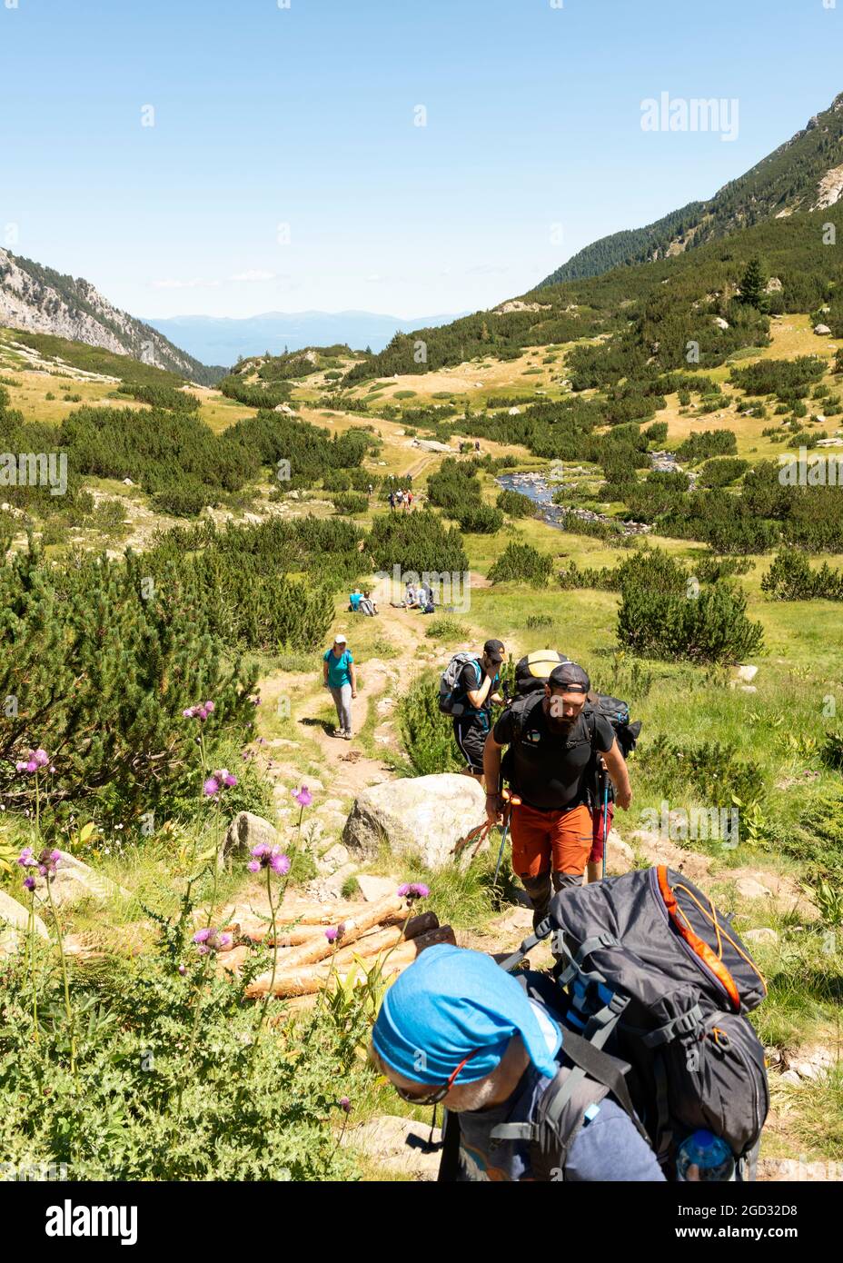 Hiking in Bulgaria. Hikers on hiking trail in Banderitsa river valley ...