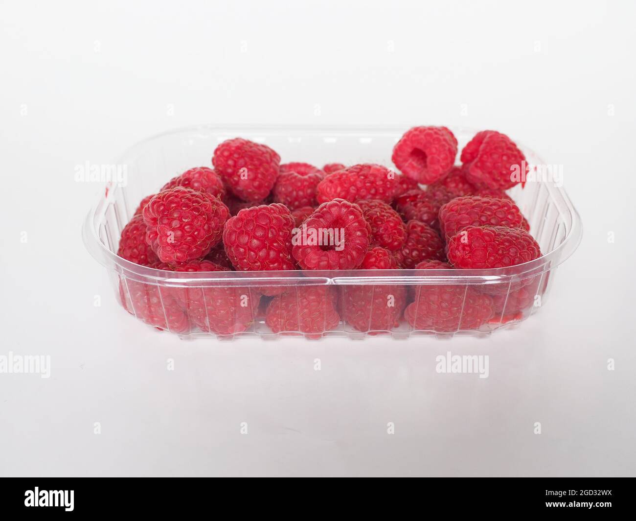 raspberry fruits in a takeaway plastic box Stock Photo - Alamy