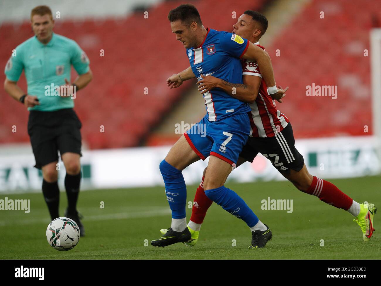 Sheffield, England, 10th August 2021. Joe Riley of Carlisle United holds off Tyler Smith of Sheffield Utd during the Carabao Cup match at Bramall Lane, Sheffield. Picture credit should read: Darren Staples / Sportimage Stock Photo