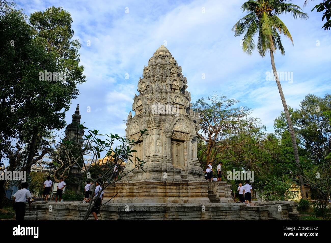 Cambodia Krong Siem Reap - Wat Damnak Prang tower in garden area Stock Photo