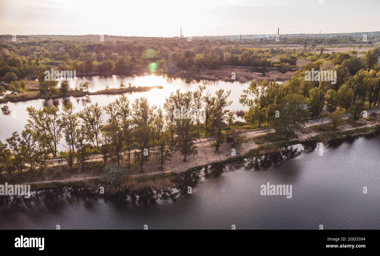 Aerial sunny view on water recreation park area. Sandy beach on summer lake Komsomolske Ozero in Kharkiv, Ukraine Stock Photo