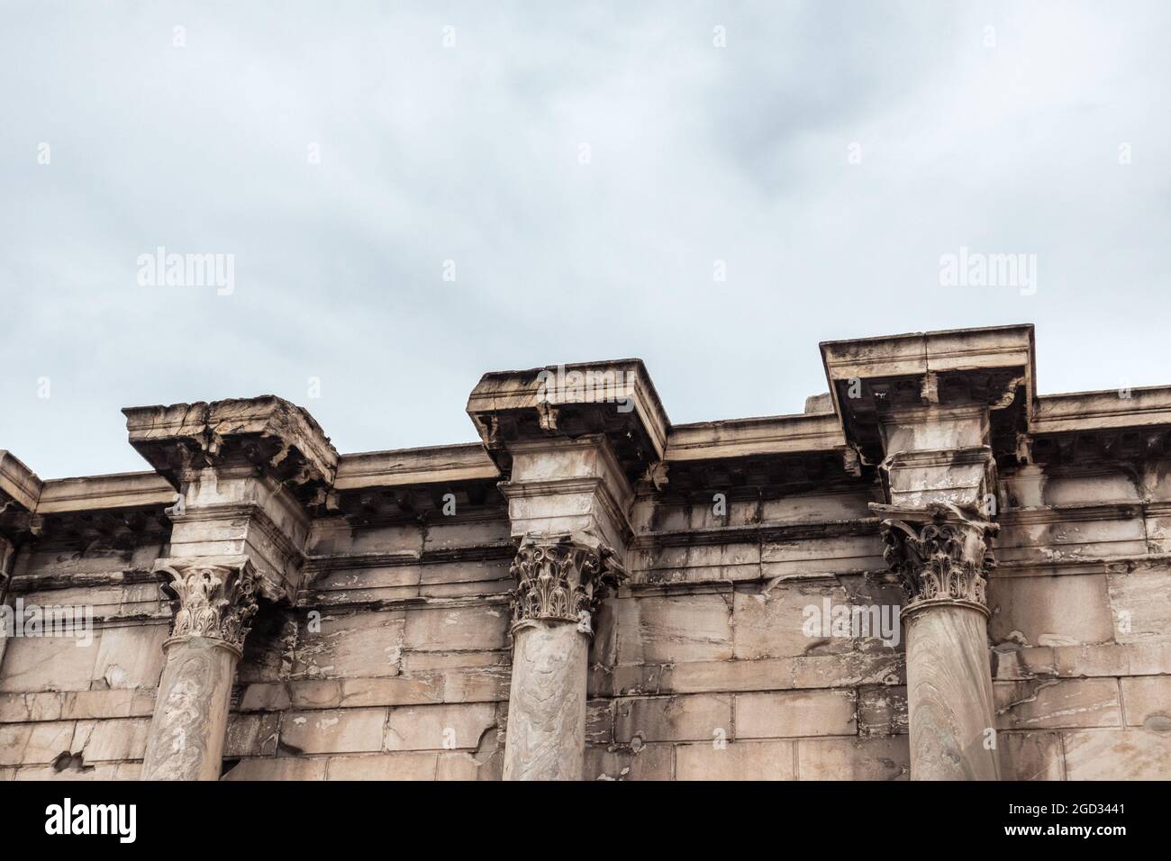 Hadrian's Library wall, three green marble columns capital closeup