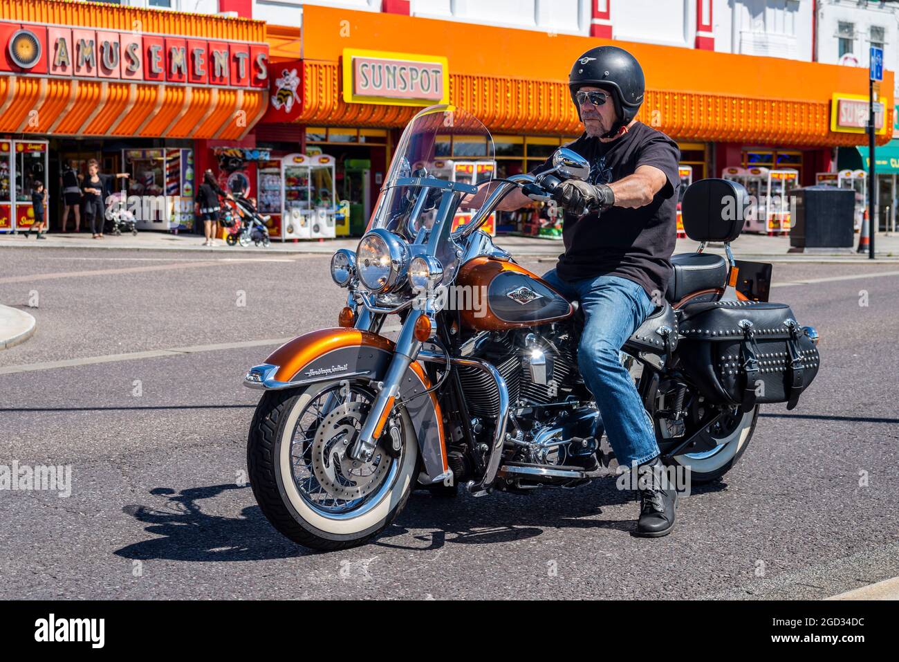 Harley Davidson Heritage Softail Motorcycle On Marine Parade Southend On Sea Essex Uk Past Seafront Amusement Arcades On Bright Sunny Summer Day Stock Photo Alamy
