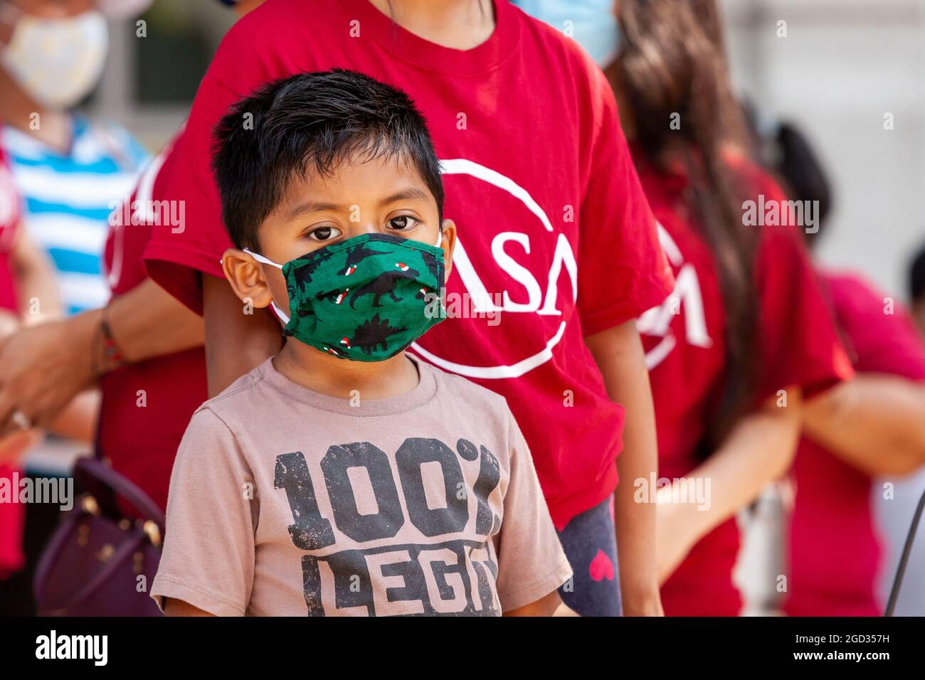 Washington, DC, USA, 10 August, 2021.  Pictured: A boy whose father has been detained by Immigration and Customs Enforcement (ICE) attends a rally demanding that ICE treat immigrants as people, not simply 'priority' or 'non-priority' categories.  Credit: Allison Bailey / Alamy Live News Stock Photo