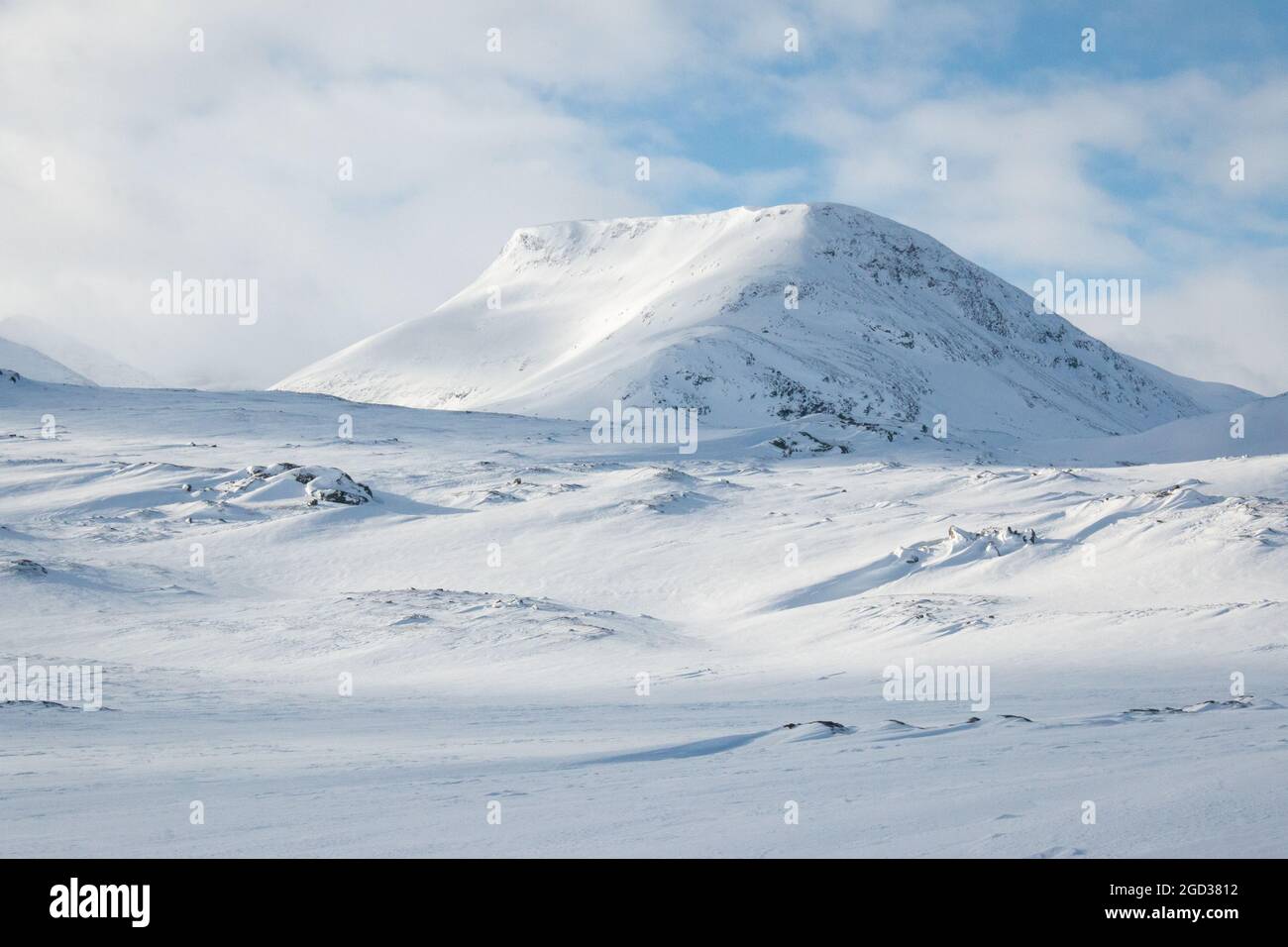 Mountains around Kungsleden trail close to Alesjaure hut at sunrise in April 2021, Lapland, Sweden Stock Photo