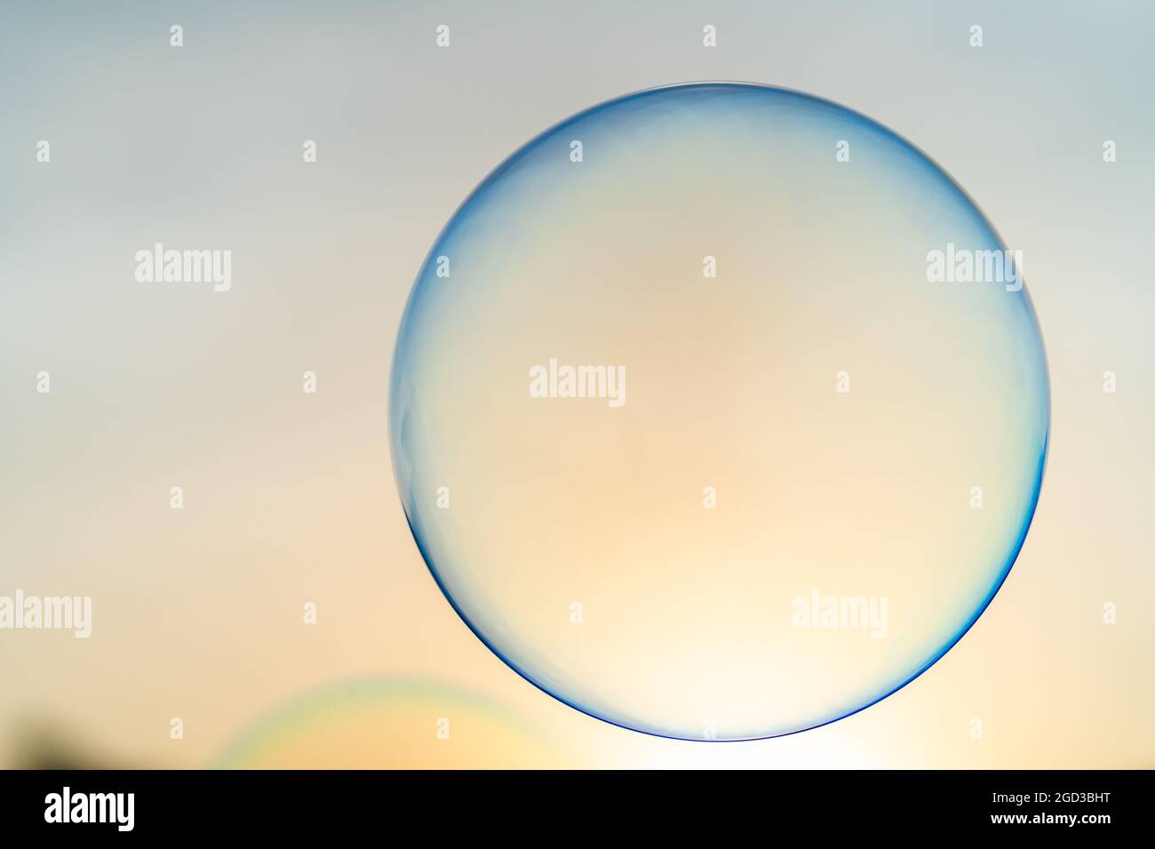 Floating reflective soap bubble in the sky Stock Photo - Alamy