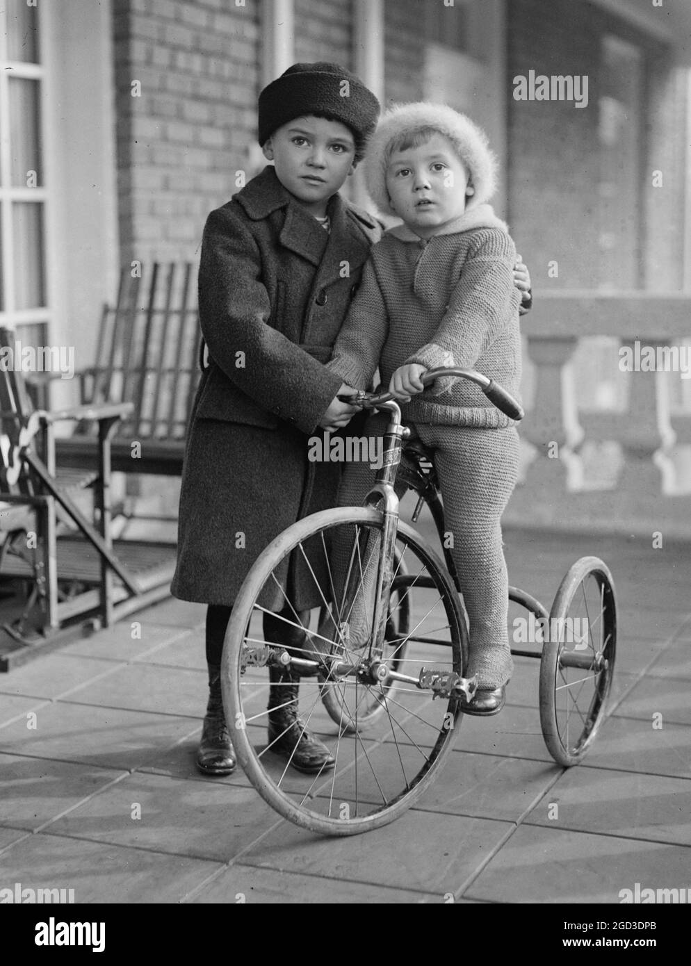 Child riding a tricycle ca. 1923 Stock Photo Alamy