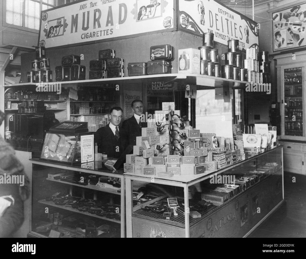 cigarettes smoked counter Interior of People's Drug Store, 7th and K Streets, Washington, D.C., with  employees behind counter with