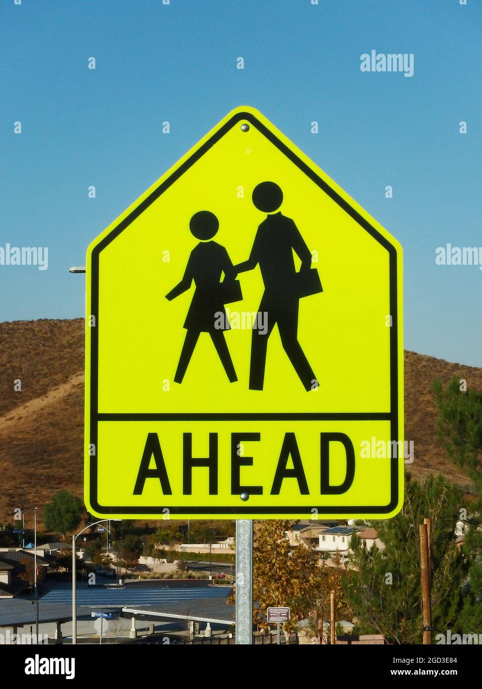 Close up view of school crossing ahead sign Stock Photo