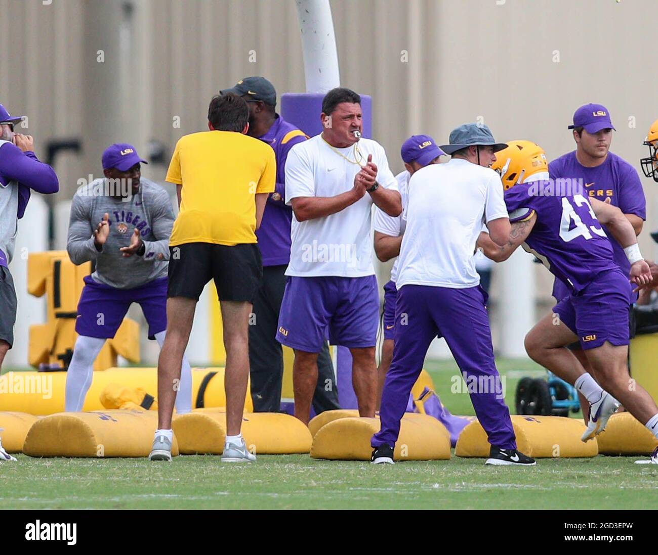 August 10 21 Lsu Head Coach Ed Orgeron Claps As His Team Runs Drills Through Bags During The First Week Of Fall Football Camp At The Lsu Charles Mcclendon Practice Facility In