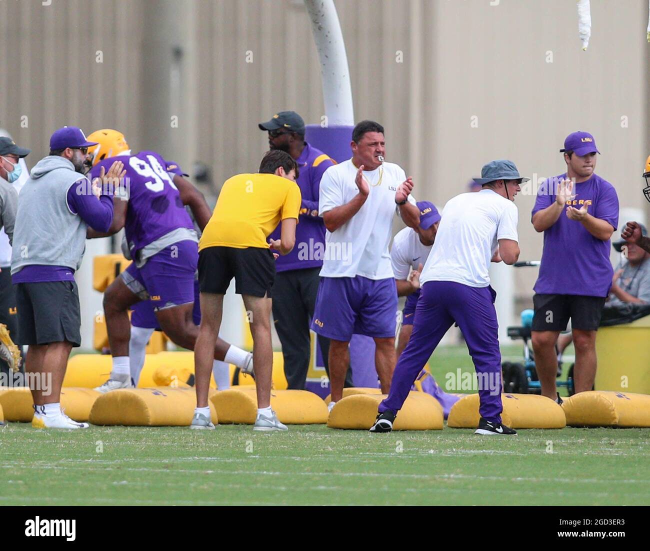 August 10 21 Lsu Head Coach Ed Orgeron Claps As His Team Runs Drills Through Bags During The First Week Of Fall Football Camp At The Lsu Charles Mcclendon Practice Facility In