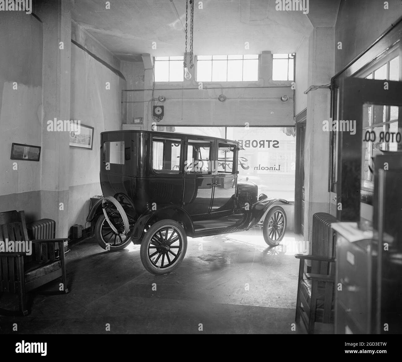 Strobel Motor Company car dealership (probably a Ford auto shown here