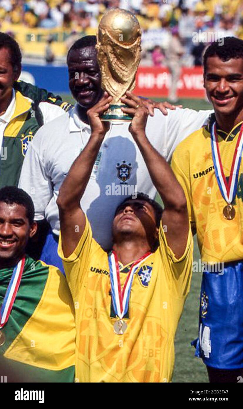 Brazilian super star Romario holds the 1994 World Cup trophy after beating Italy in the final. Stock Photo