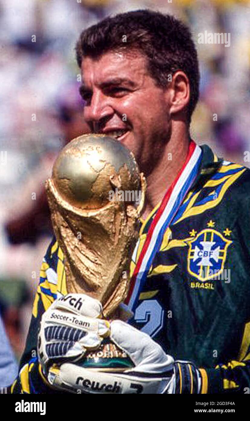 Brazilian goalkeeper Zetti holds the 1994 FIFA World Cup trophy after the final against Italy. Stock Photo