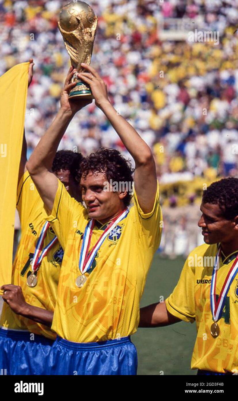 brazilian soccer player Branco holds up the FIFA World Cup trophy after the 1994 World Cup final victory over Italy Stock Photo