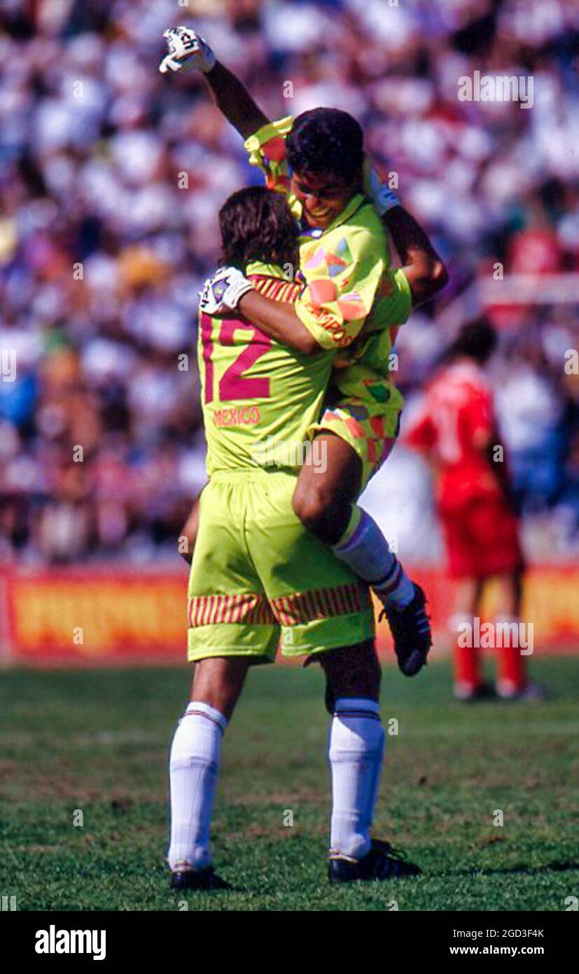 Colorful Mexican goalkeeper Jorge Campos celebrate a win Stock Photo