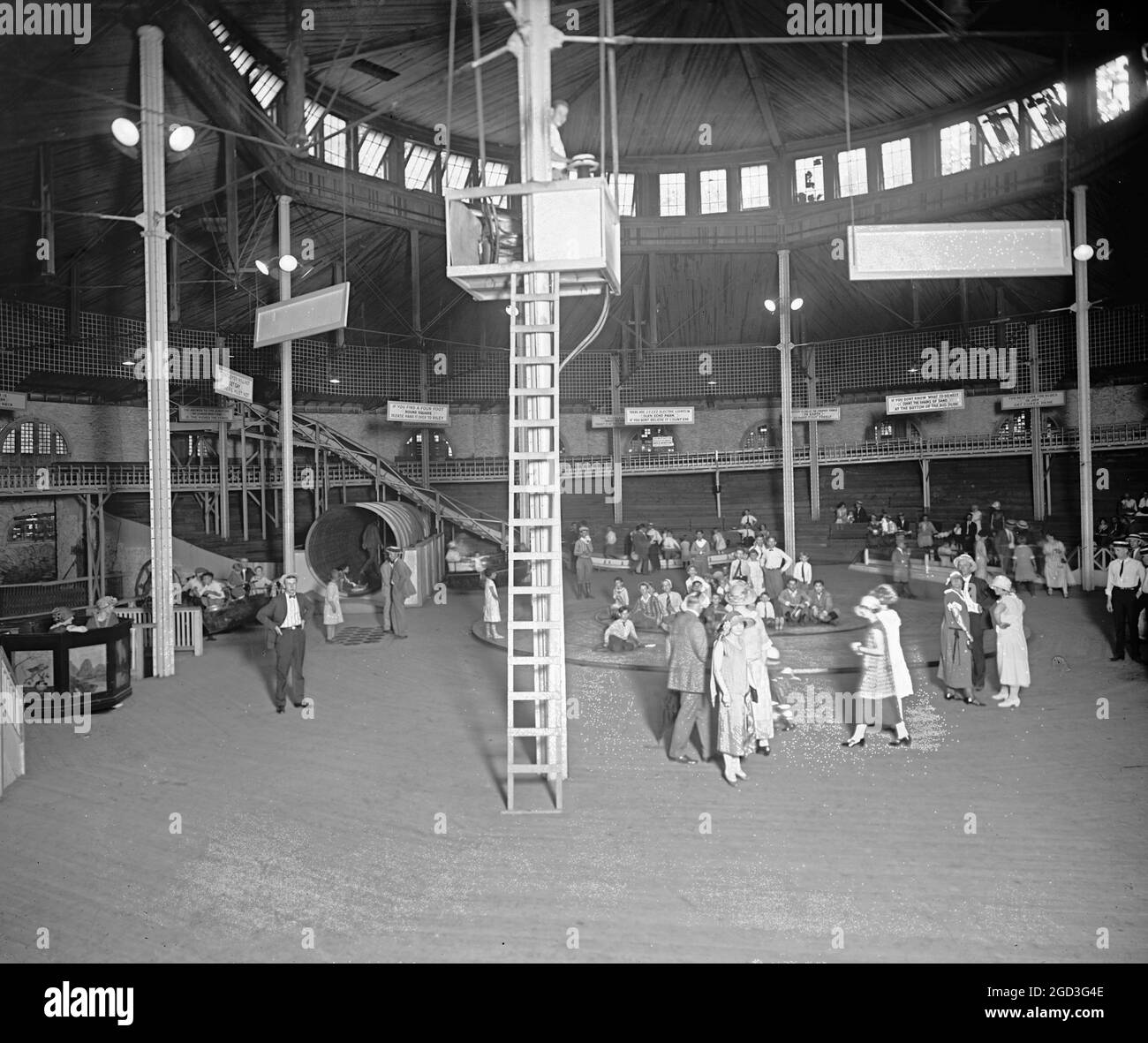 People having fun at Glen Echo Park amusement park, possibly the Fun