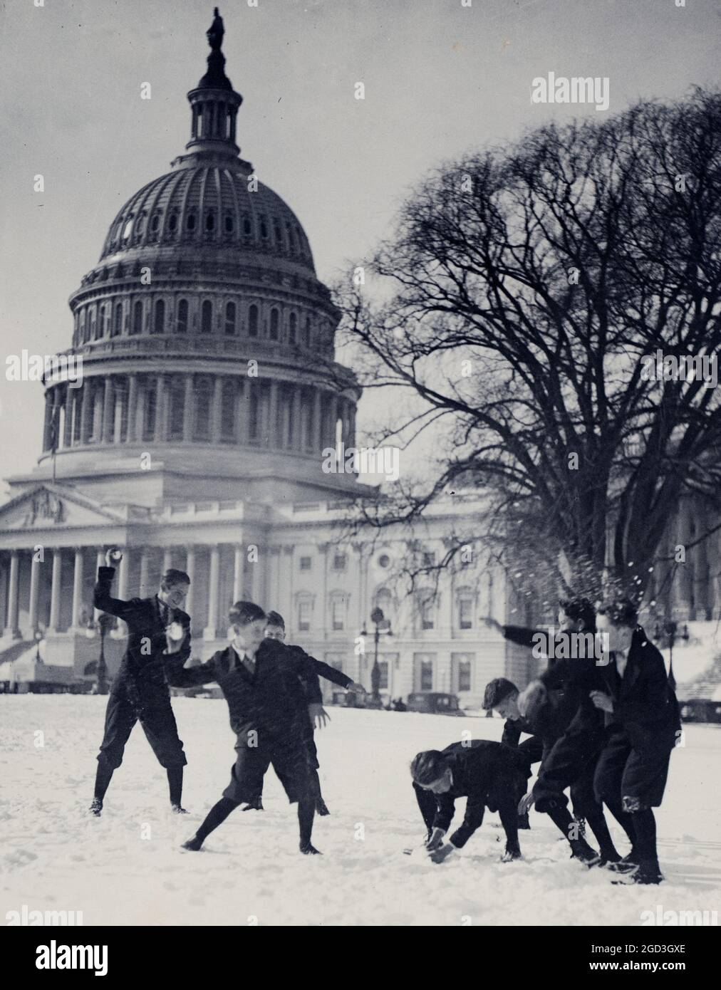 Senate page boys stage their first snow battle on the Capitol plaza ca. 1909 Stock Photo