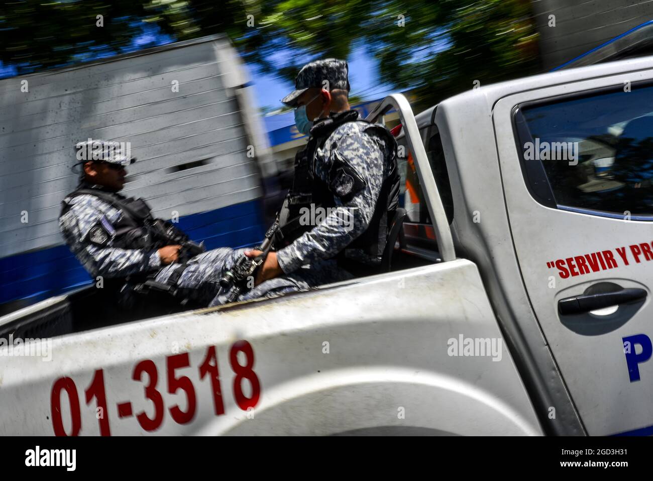 Ilopango, El Salvador. 10th Aug, 2021. Police officers perform a search operative while patrolling the Cumbres de San Bartolo community which is controlled by the 18th street gang. (Credit Image: © Camilo Freedman/ZUMA Press Wire) Stock Photo