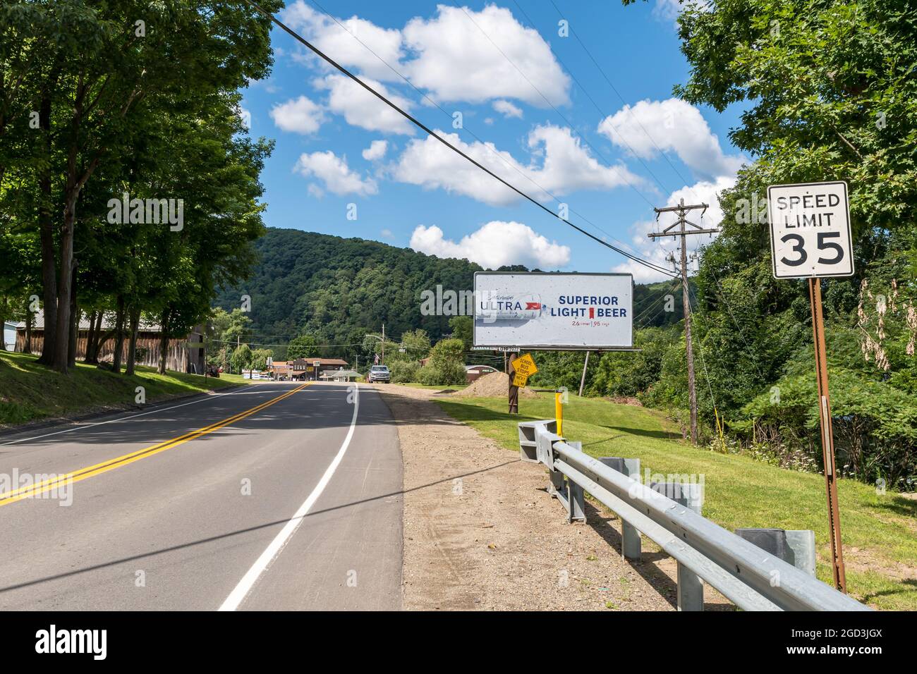 State Route 62 south in Warren County on a sunny summer day in Tidioute, Pennsylvania, USA Stock Photo