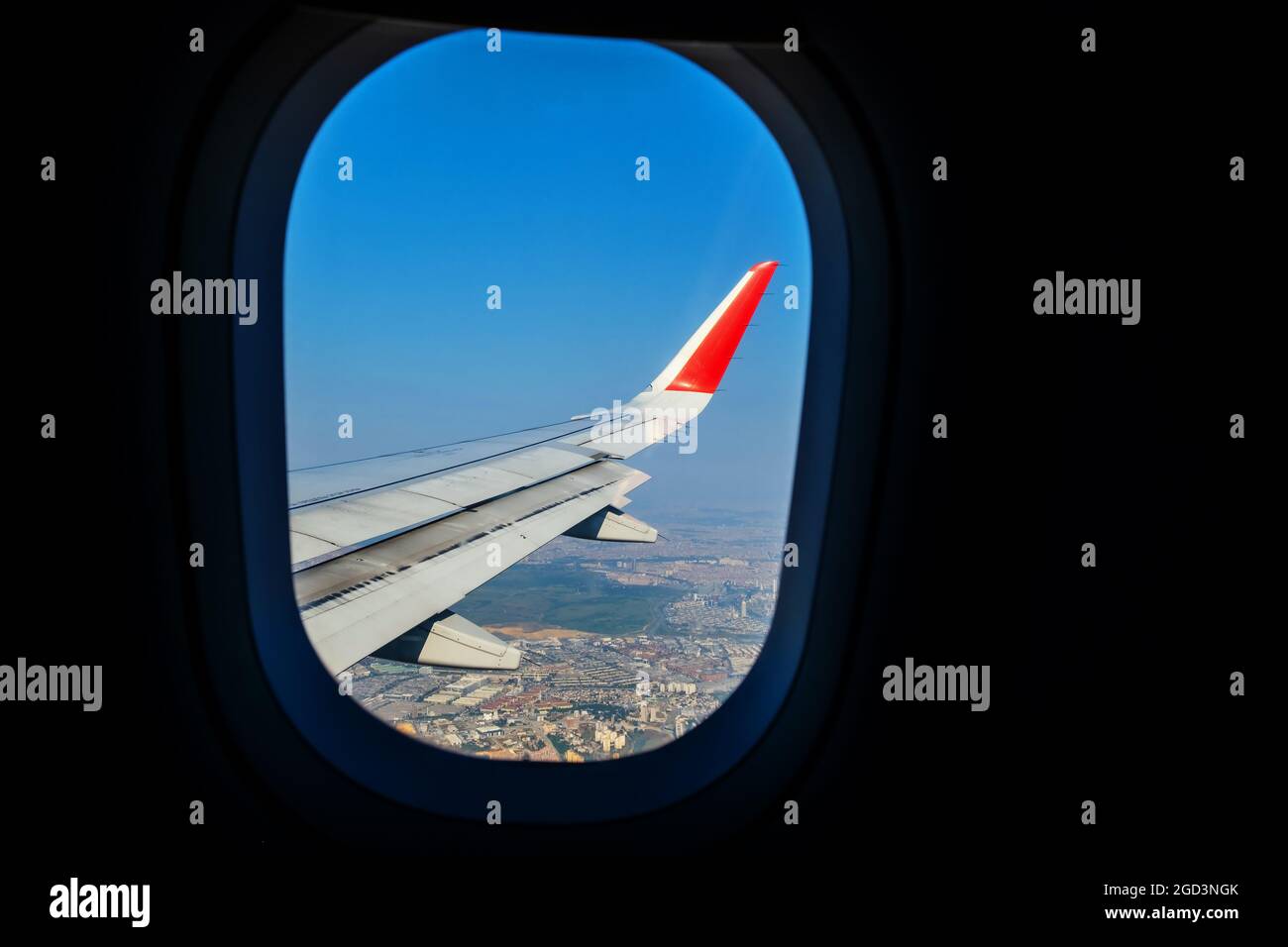 Looking through window aircraft during flight in wing lands over ...