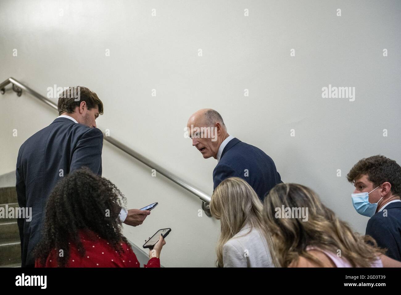 United States Senator Rick Scott (Republican of Florida) talks with reporters as he walks through the Senate subway during a vote at the US Capitol in Washington, DC, USA, Tuesday, August 10, 2021. The Senate is expected to vote today on final passage of the bipartisan $1 trillion H.R. 3684, Infrastructure Investment and Jobs Act. Photo by Rod Lamkey/CNP/ABACAPRESS.COM Stock Photo