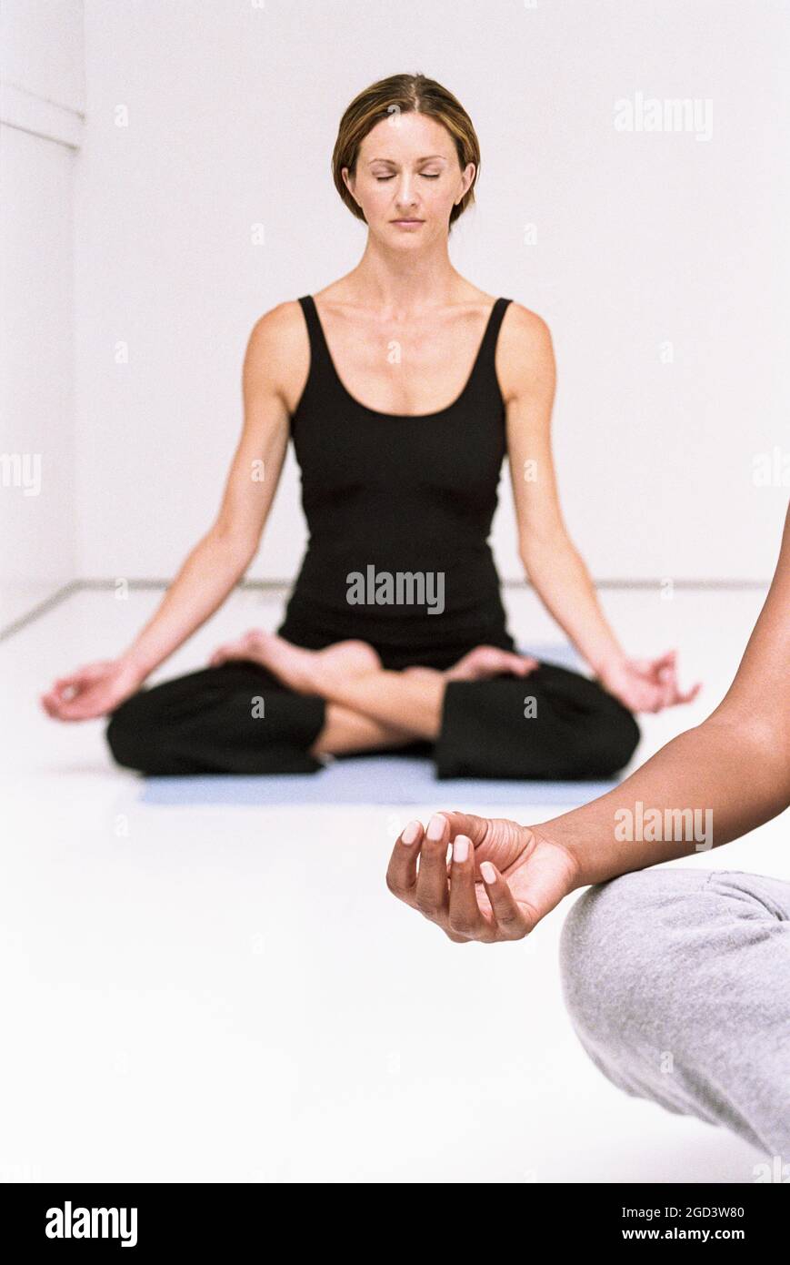 #HealthAndFitness #PhotoShoots #Focus #Meditation #Breathe #LotusPosition #Padmasana #Wellness  #YogaPractice #TimMcGuirePhotographer #TimMcGuireImage Stock Photo