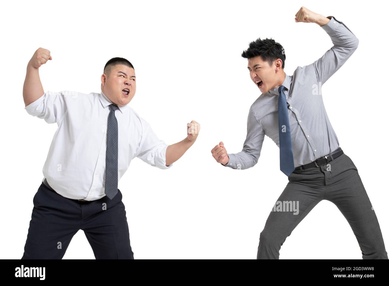 Young businessmen fighting Stock Photo