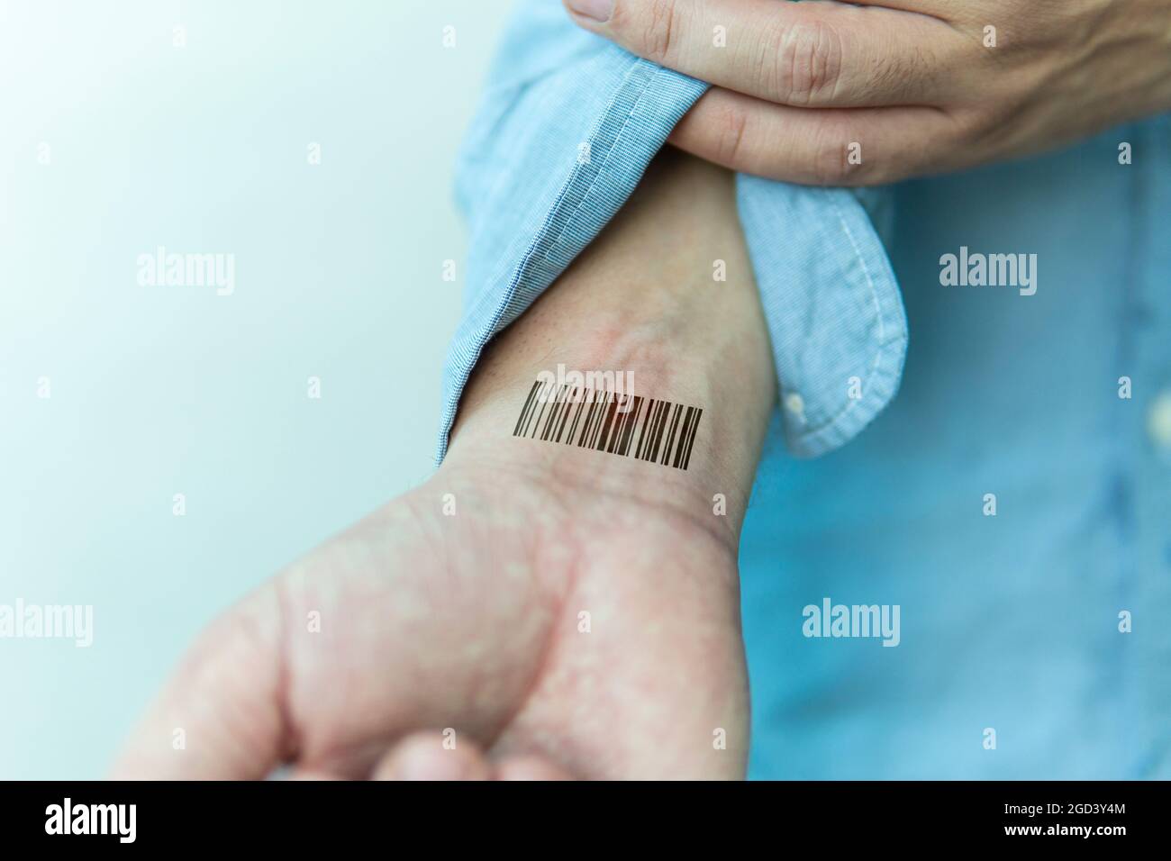 Bar code is on a man hand. Clone of DNA and human genome. The concept digital electronic cards, tracking during the pandemic, in quarantine. Mass chip Stock Photo