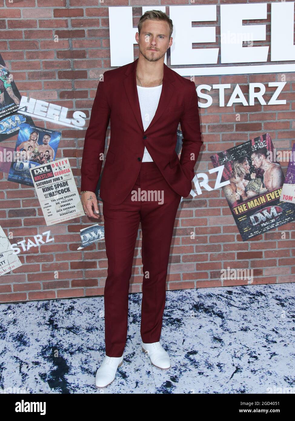 Los Angeles, United States. 10th Aug, 2021. LOS ANGELES, CALIFORNIA, USA -  AUGUST 10: Actor Alexander Ludwig wearing a Paul Smith suit, Christian  Louboutin shoes, a Montblanc water and David Yurman jewelry