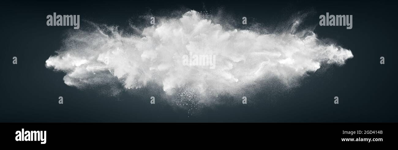Abstract wide horizontal design of white powder snow cloud explosion on dark background Stock Photo