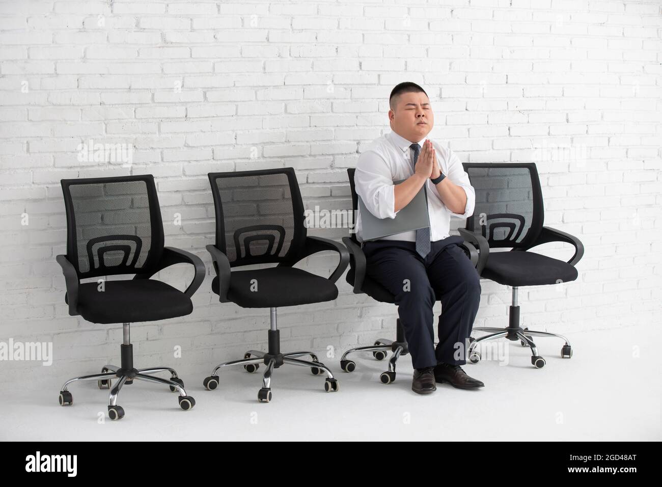 Young businessman waiting for job interview Stock Photo