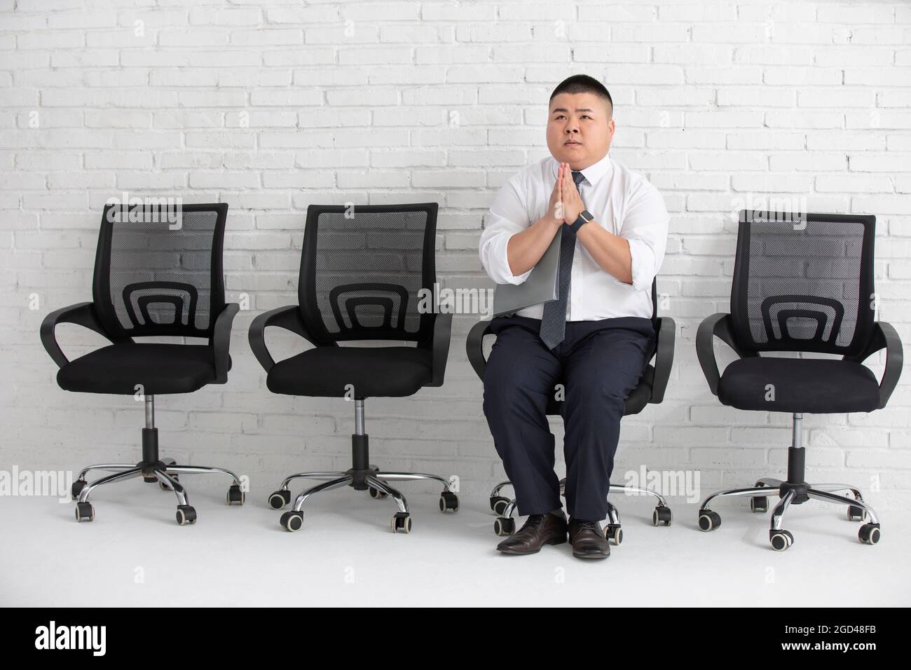 Young businessman waiting for job interview Stock Photo