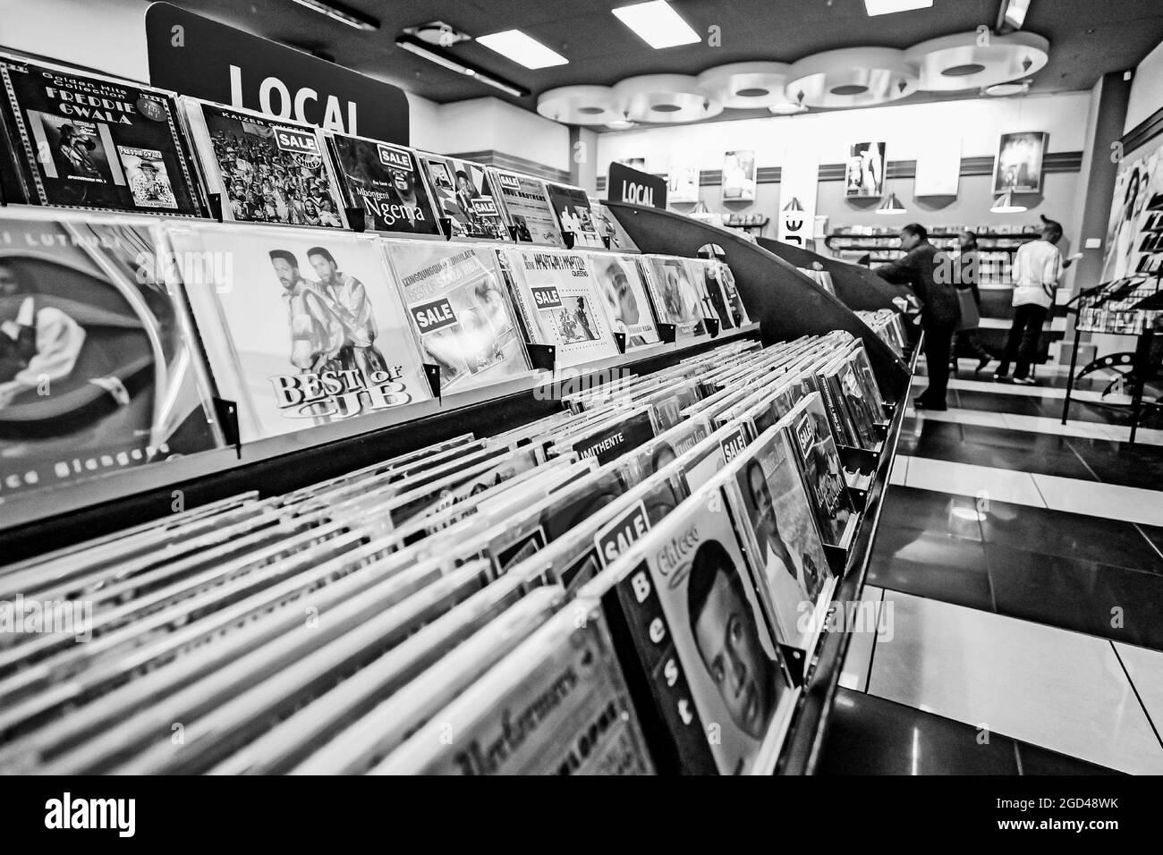 JOHANNESBURG, SOUTH AFRICA - Jan 06, 2021: A grayscale of the interior of a Music CD Store in a mall in Johannesburg, South Africa Stock Photo
