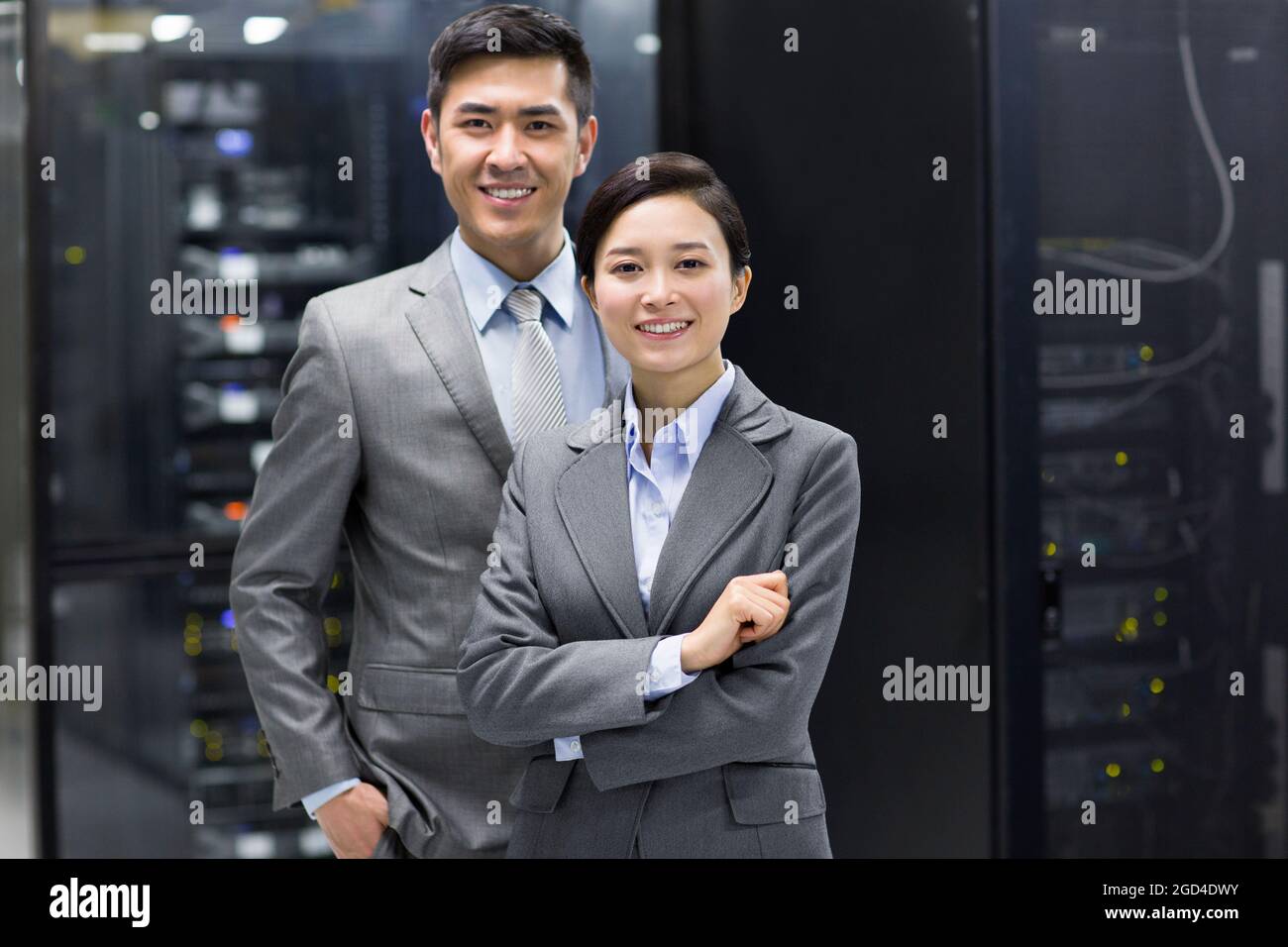 Business persons in computer room Stock Photo