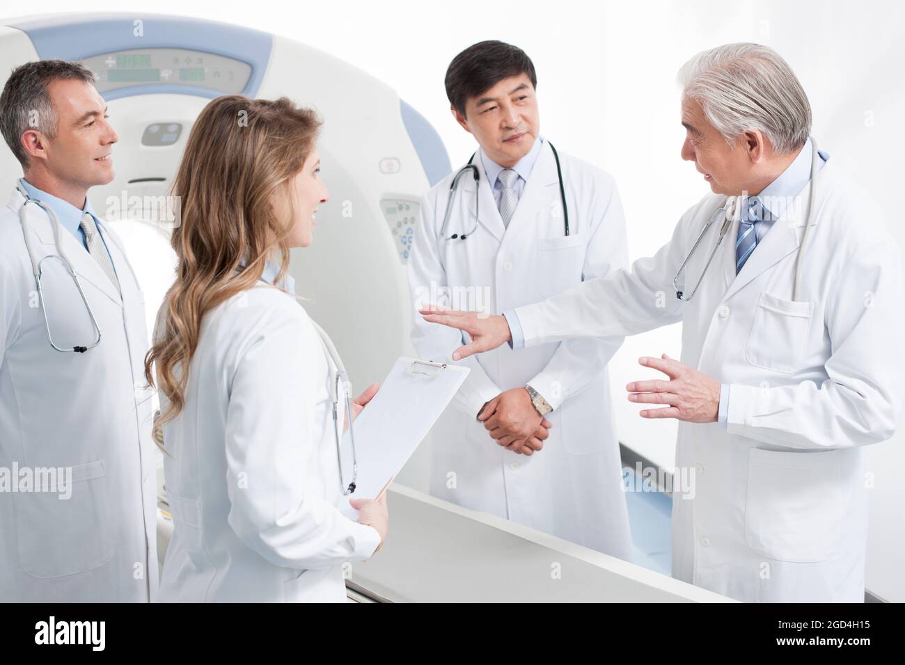 Doctors in CT room Stock Photo