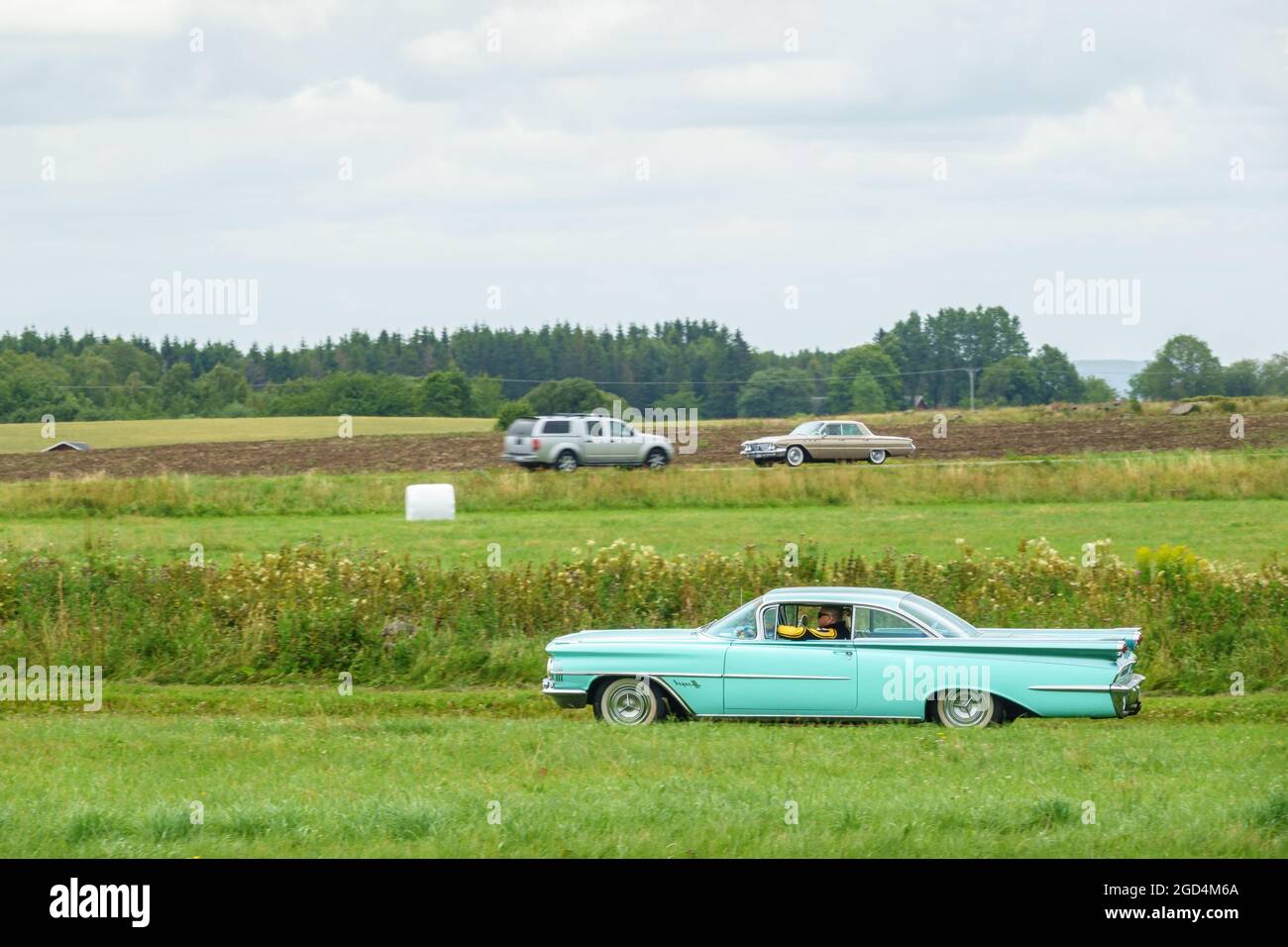Classic cars in the countryside Stock Photo