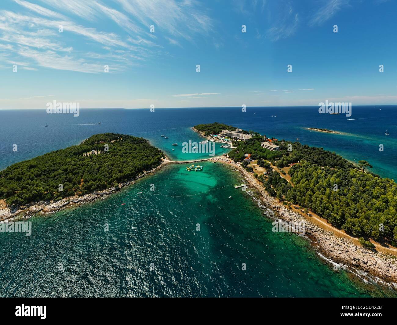 Red island near by Rovinj city in Croatia. Croatian name is Otocic Maskin. It has a hotel, aquapark, chruch monument and amazing beaches Stock Photo