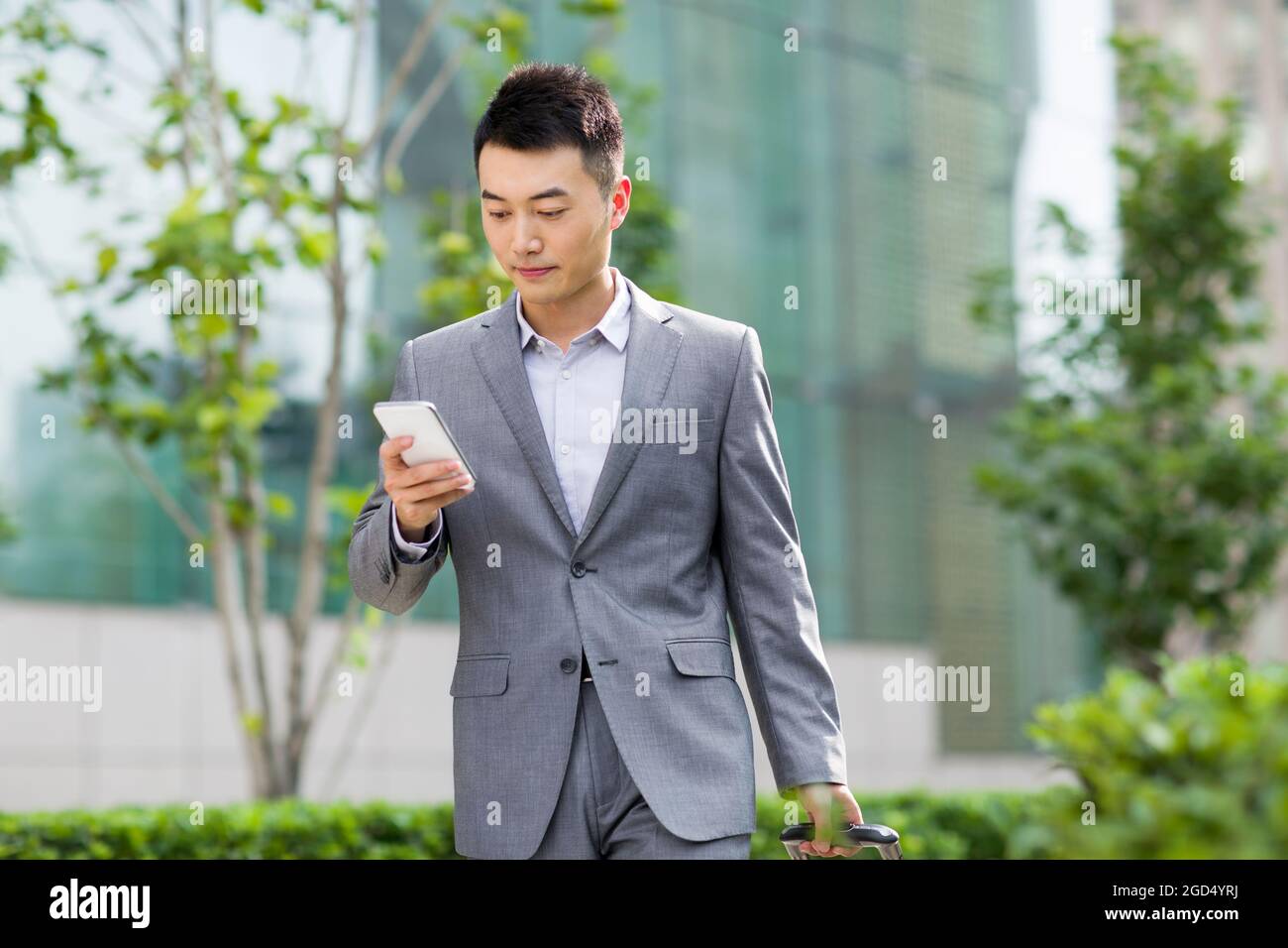 Businessman with mobile phone Stock Photo