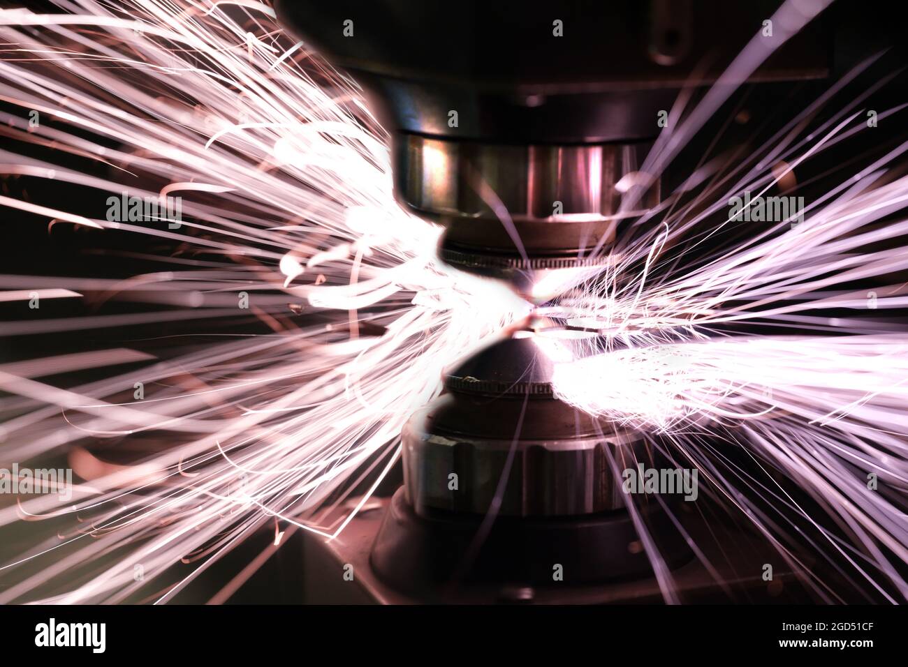 Laser cut machine industrial metal processing process closeup background Stock Photo