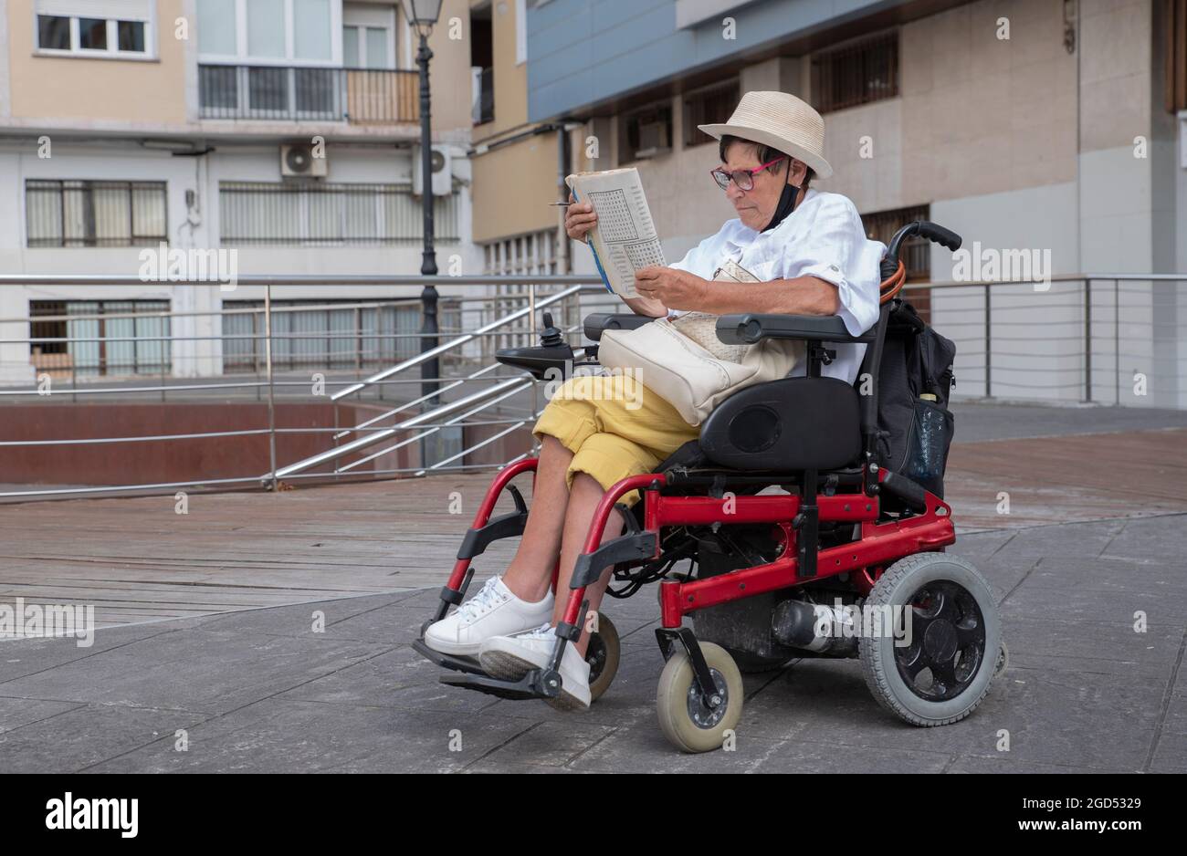 disabled woman doing hobbies in her wheelchair Stock Photo Alamy