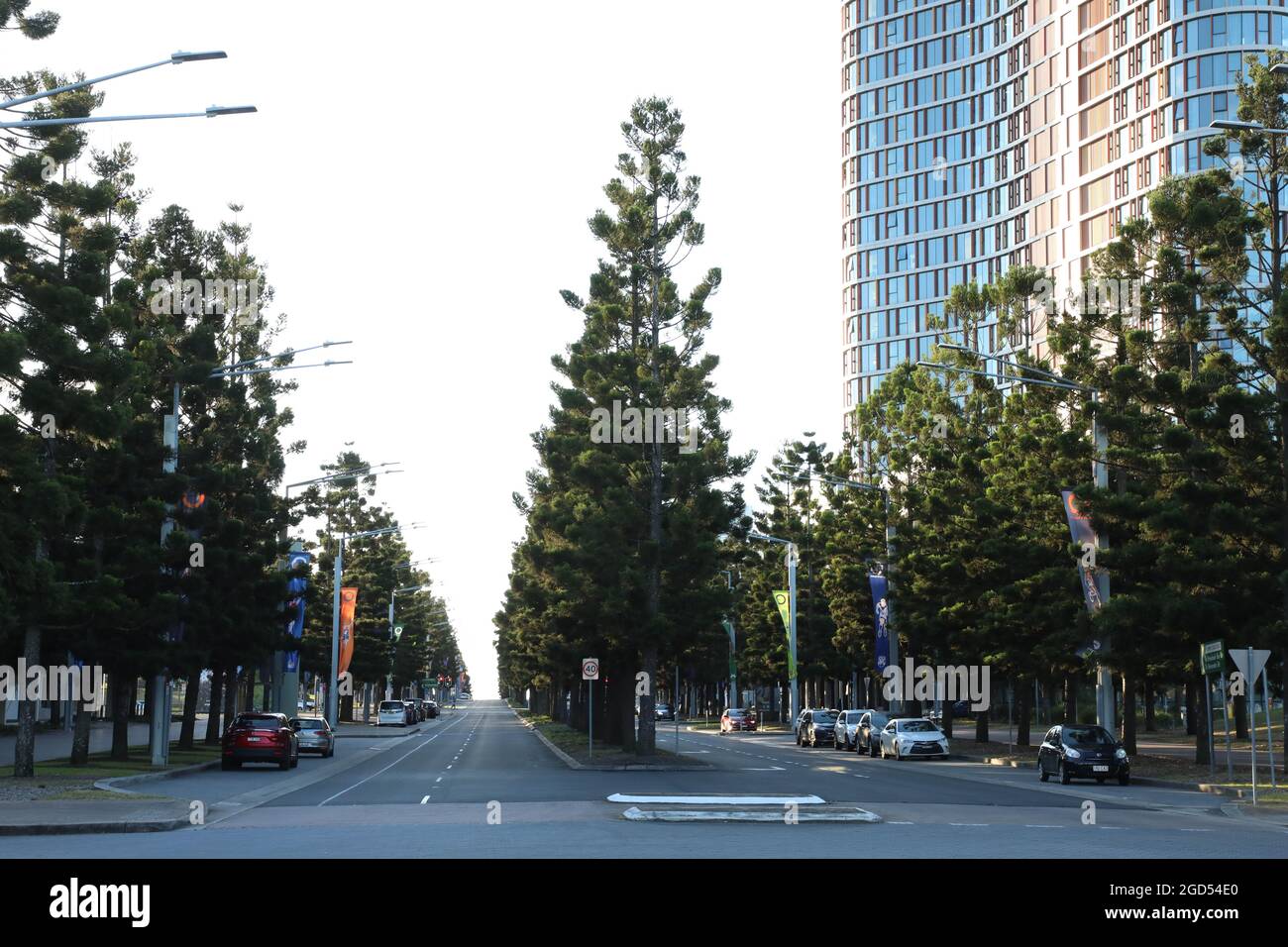 View looking down Olympic Boulevard from Shirley Strickland Avenue, Sydney Olympic Park. Stock Photo