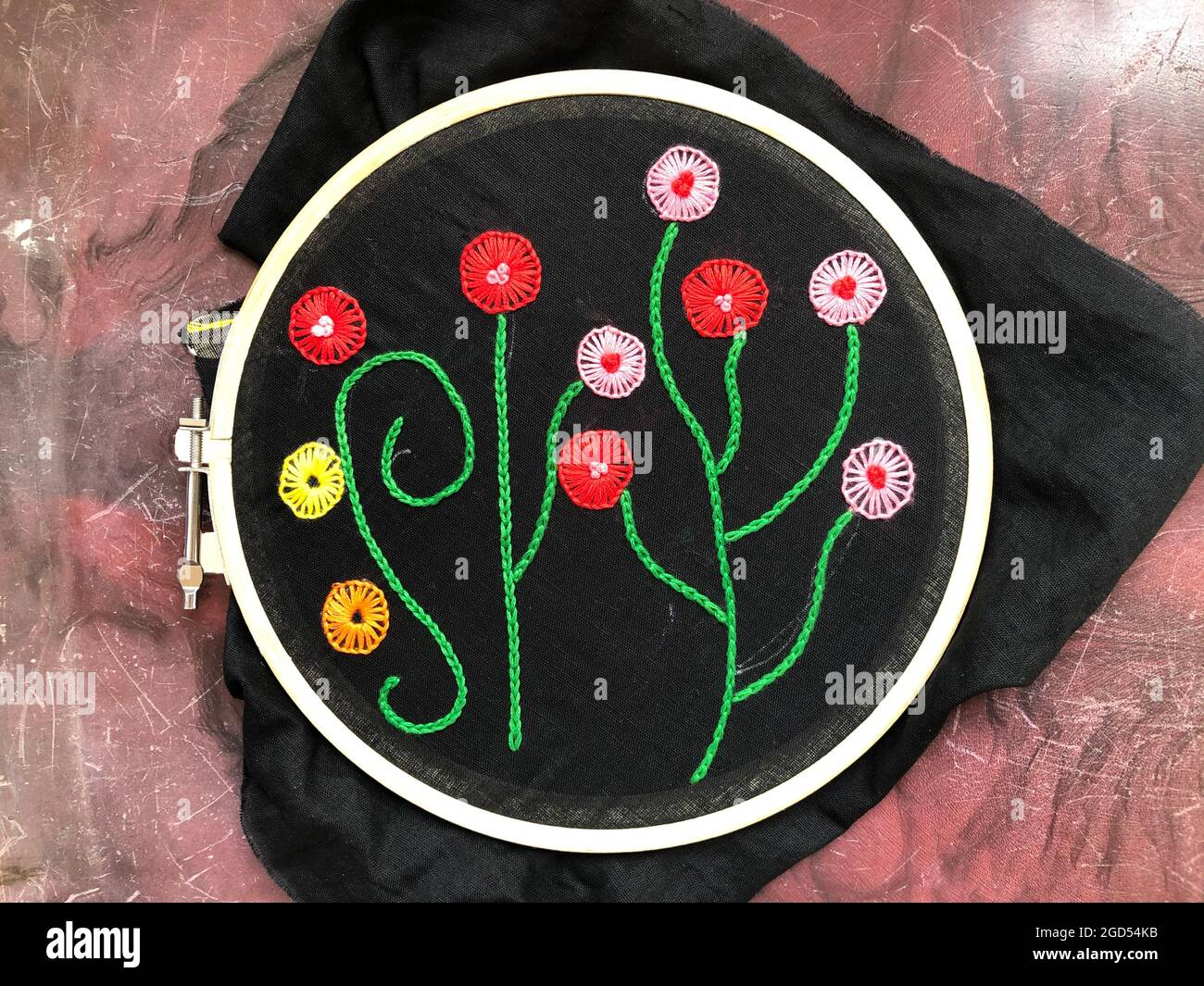 Blanket stitch and hand embroidered flower design with chain stitch