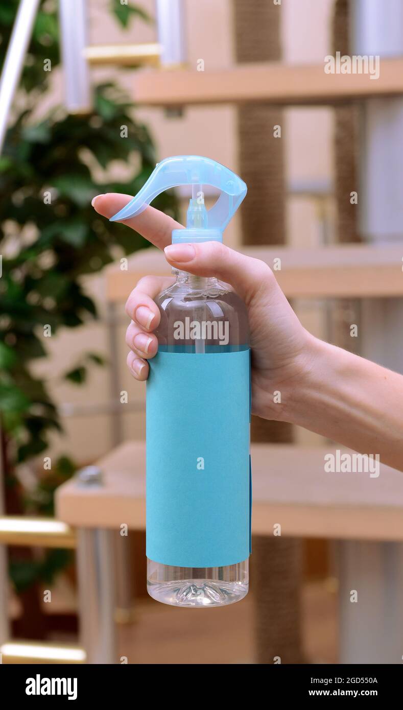 Sprayed air freshener in hand closeup Stock Photo Alamy