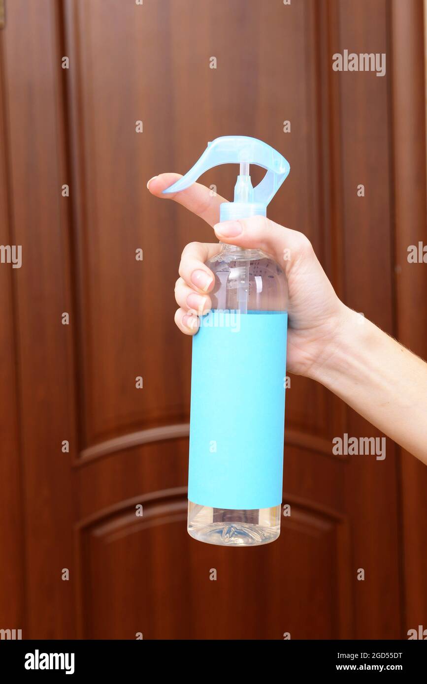 Sprayed air freshener in hand closeup Stock Photo Alamy