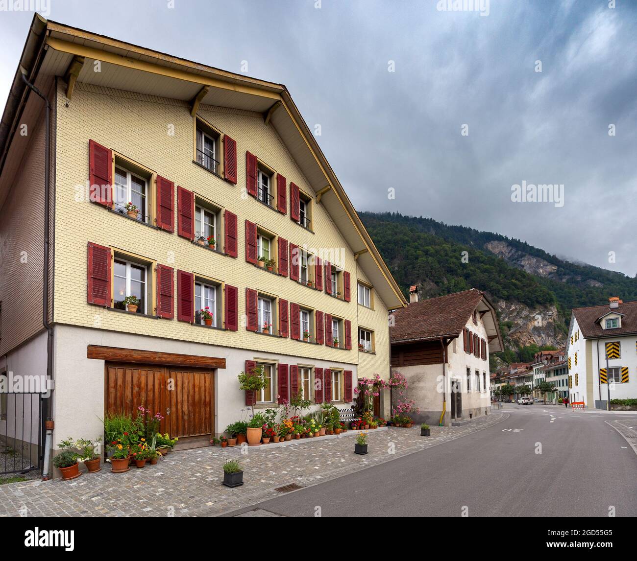 Facades of houses on an old city street. Interlaken. Switzerland Stock Photo Alamy