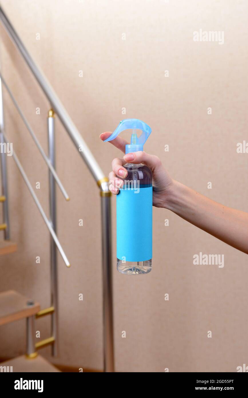 Sprayed air freshener in hand closeup Stock Photo Alamy