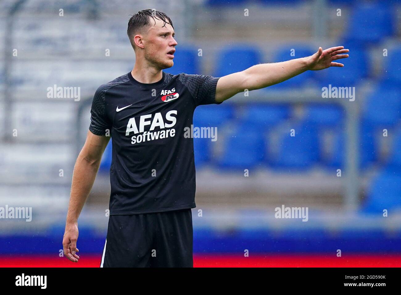 GENK, BELGIUM - JULY 14: Mujaid Sadick of Genk coaches his teammates during  the Club Friendly match between KRC Genk and AZ Alkmaar at Luminus Arena on  July 14, 2021 in Genk