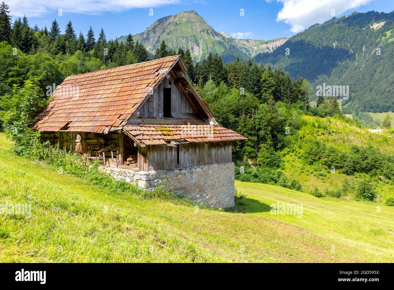 View of the traditional medieval alpine village on a sunny day. Lungern Switzerland. Stock Photo