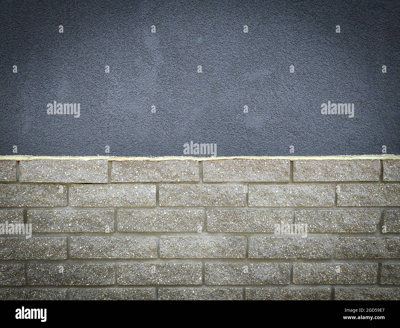 Gray stone grunge and brick wall texture - closeup Stock Photo